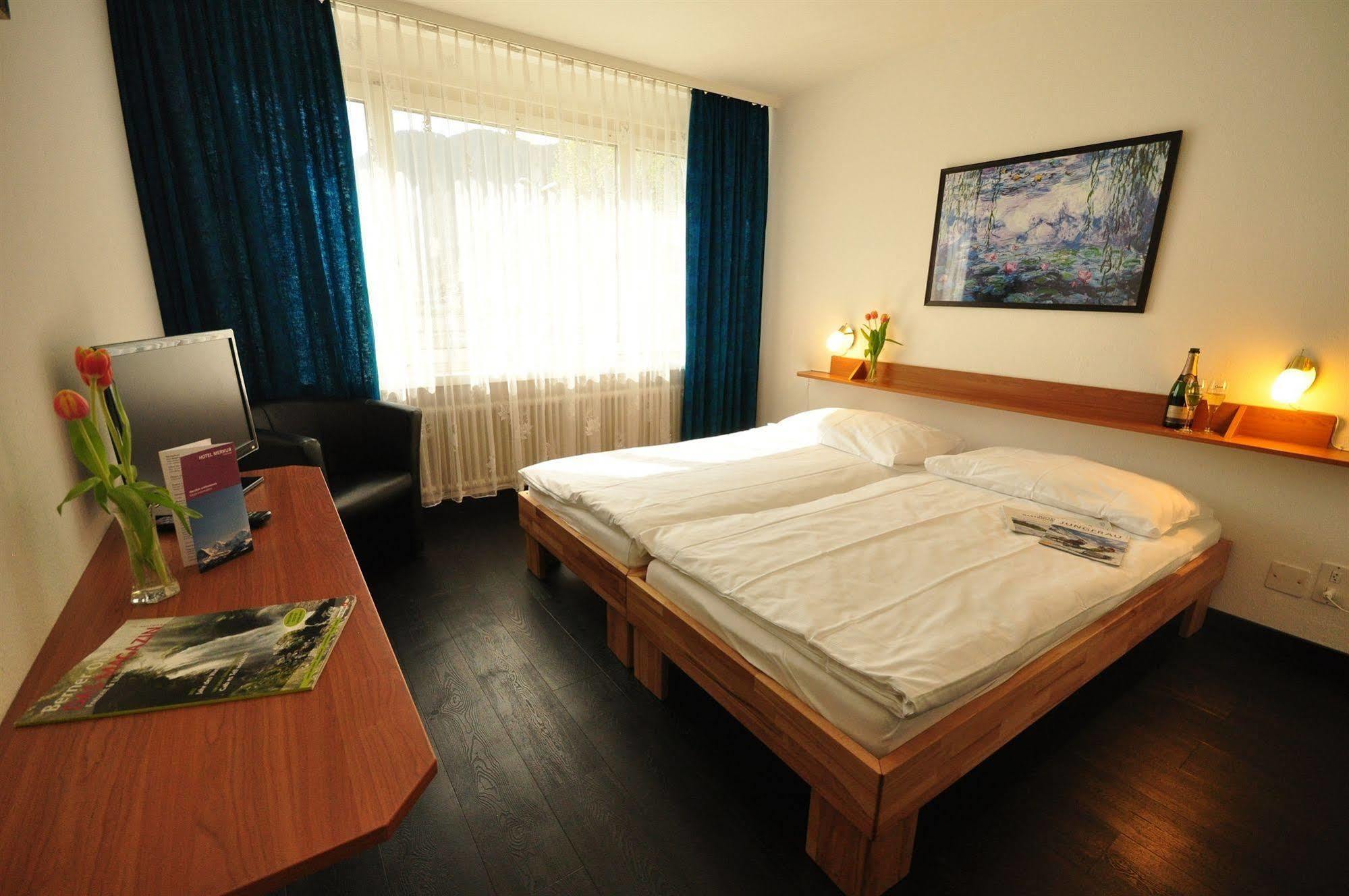 Hotel Merkur - West Station Интерлакен Экстерьер фото
